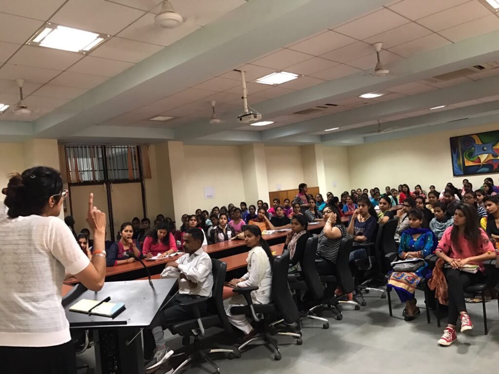 A hall of students during a Punjabi Doc lecture on addiction