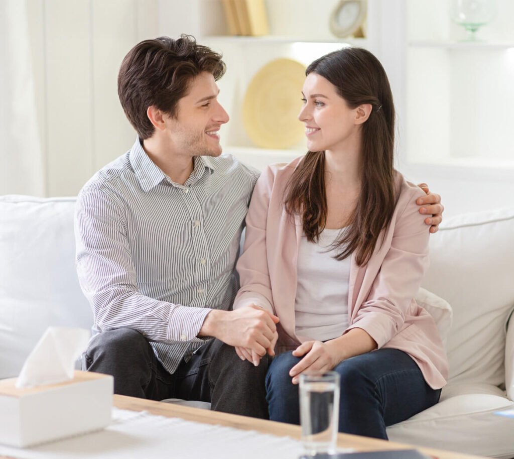 A family in conversation during a support session